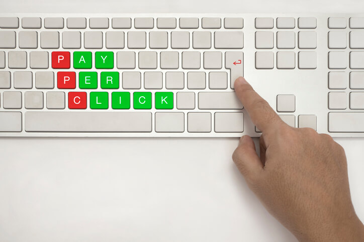 Pay Per Click (PPC) written on keyboard keys in green and red